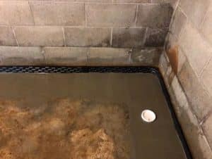 basement waterproofing work in progress
